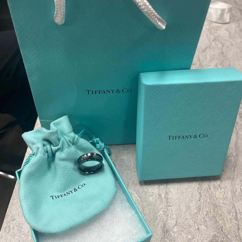 NWOT Tiffany and Co. Authentic Titanium ring. Size 6